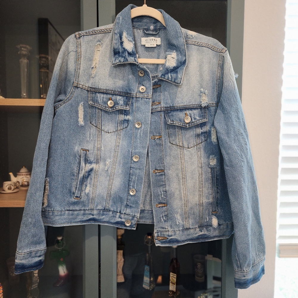 Distressed Jean jacket x-large.  CI SONO